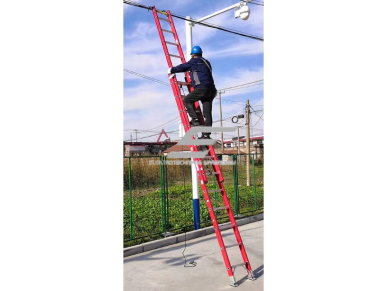 Izoliuotos teleskopinės kopėčios | elektros priežiūros darbams | ištraukiamos | 10,7m | 150kg | raudona 3 Izoliuotos teleskopinės kopėčios | elektros priežiūros darbams | ištraukiamos | 10,7m | 150kg | raudona 3
